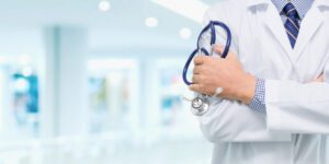 Doctor with a stethoscope in the hallway